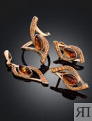 Изящное ажурное кольцо «Ренессанс» из золота с янтарём коньячного цвета Amb